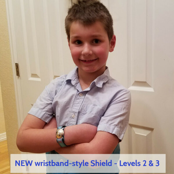 Cute boy wearing Wristband Shield with blue ID band