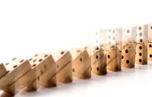 Dominoes falling equal a trigger event