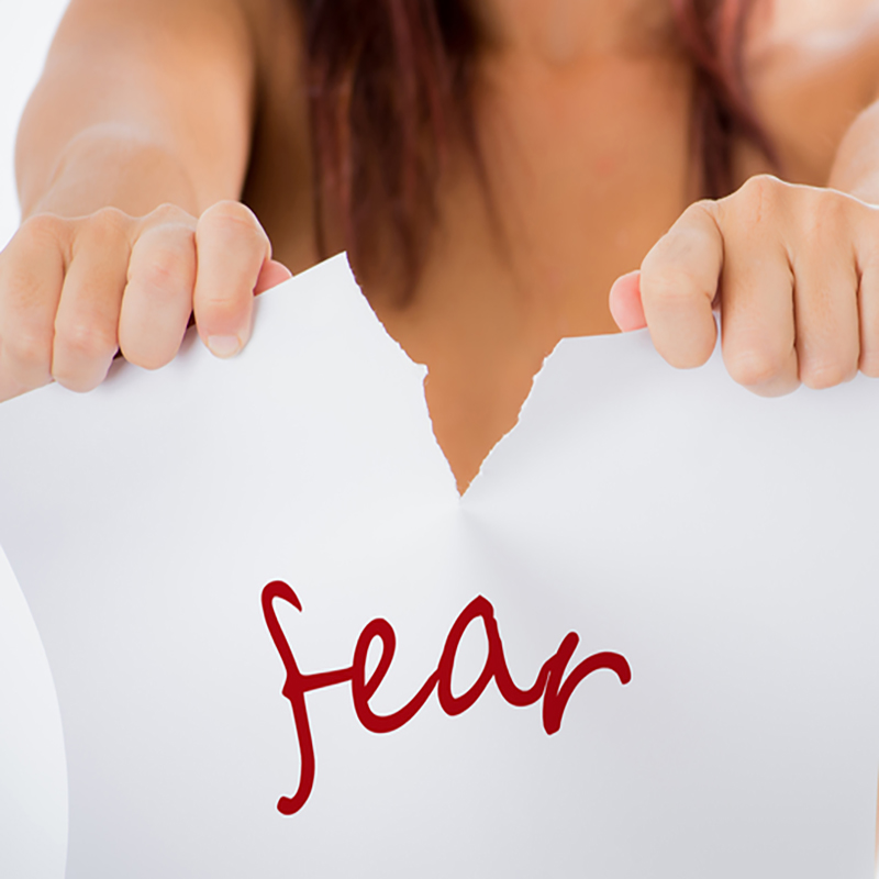Fear paper tearing indicating ripping thru fear fear and anxiety are bombarding your life fear and anxiety